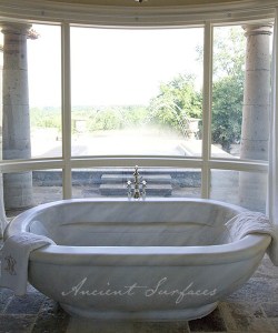An Oval Hand Carved Marble Tub