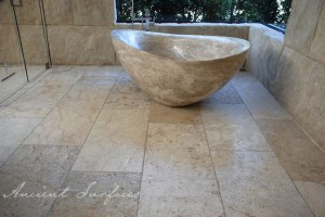 Hand Carved Oval Limestone Bath Tub with a Waved Edge