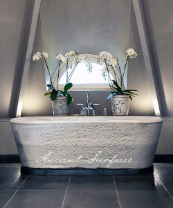 A Distressed Antique Marble Bath Tub