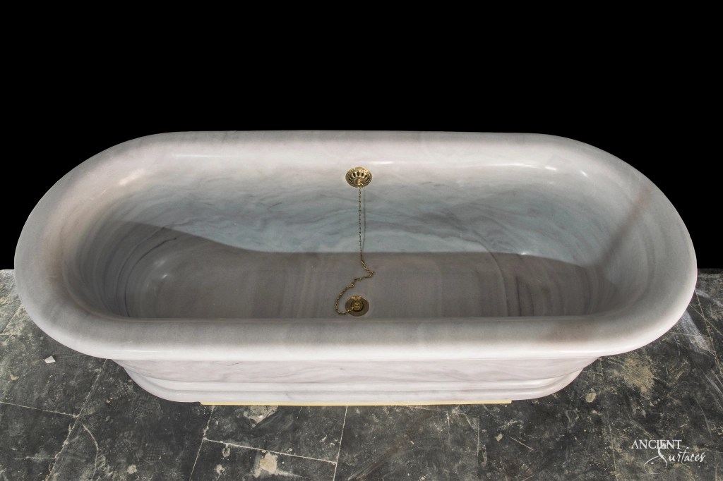 Carrara Marble 
Custom carved marble tub
Ancient surfaces
Antique marble bathtubs
Ancient marble bathtubs
Carved marble bathtubs
Modern spaces with antique marble bathtubs
Sanctuary in the bathroom with marble tubs
Historical marble bathing vessels
Outdoor marble bathtubs
Weathered marble tubs
Nature-inspired marble bathing experiences
Connecting with history through marble bathtubs
Timeless marble bathing sanctuaries
Ancient marble bathtub craftsmanship
